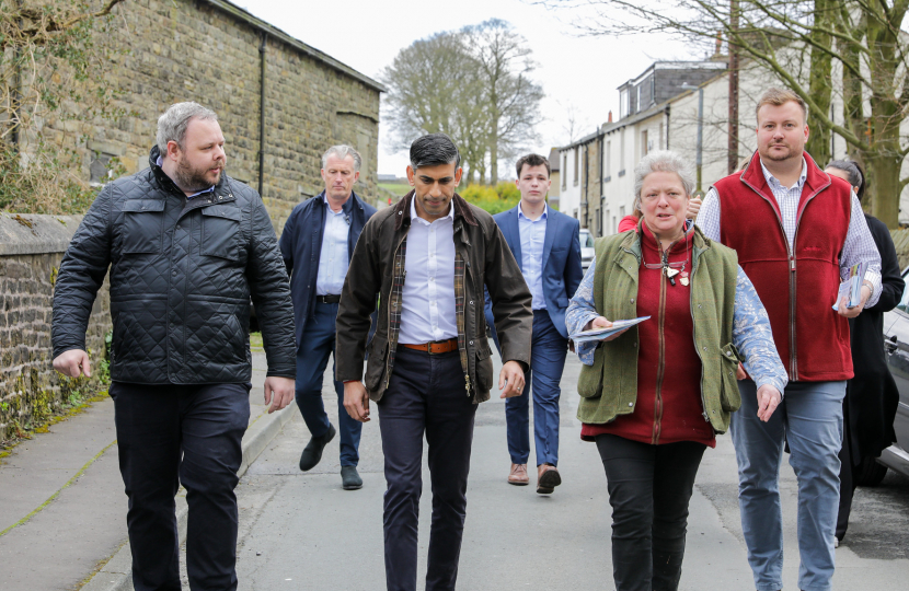 PM Rishi Sunak & local MP Antony Higginbotham walking through Worsthorne with Councillor Cosima Towneley